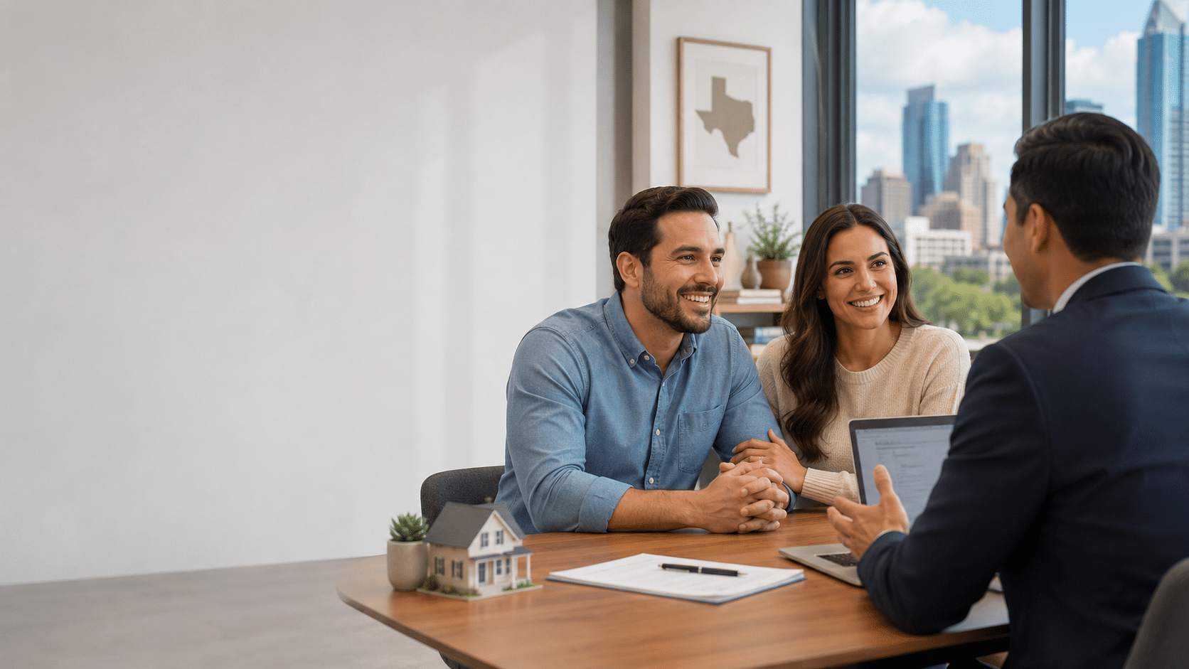 Couple discussing home financing with an advisor at a table